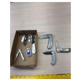 1 Kershaw, 2 Winchester and 4 misc pocket knives
