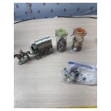 Rocks, arrowhead and cowboy and wagon