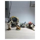 Hummingbird mirror, dive figures and deer