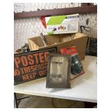 Posted sign, floodlight holder, toner, caulking