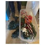 Tote of Christmas Decorations and faux flowers