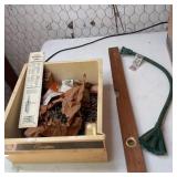 Nails, screws level and mini extension cord