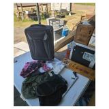 Suit case, bug net hat, grabbers and more