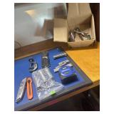 2 Box cutter, Clamo, tape measure, torch cleaners