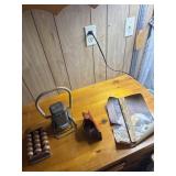 Justrite electric lantern, cigarette roller,