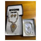 2 necklace and earring sets