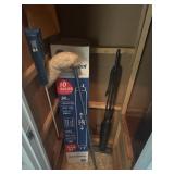 Remainder of closet broom hotshot and light bulbs