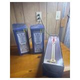 2 matching candle holders and Brass Hurricane