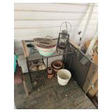 Electrified  barn lantern, flower pots and garden