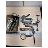 File, levels, staple gun and more