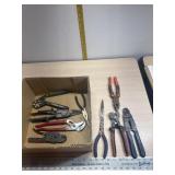 Bionic wrench, tin snips , needle nose pilers.
