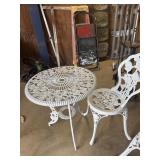 Cast aluminum table and chairs- 1 chair needs