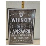 Whiskey tin sign