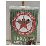 Texaco tin sign