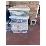 4 totes with lids of table clothes, doilies and