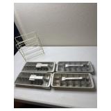 4 vintage ice cube trays, 2 Quickube and 2 Presto