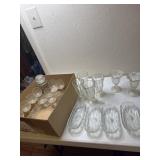 Stemmed glasses, ice cream dishes and banana