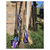 Rakes brooms 1" dowels pry bar
