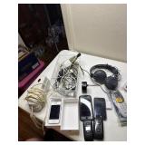 Phone, 5 cell phones, head phones and remote