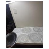 Silver colored tray and 5 glass serving trays