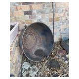 Cast iron pot 24" with legs has a chip