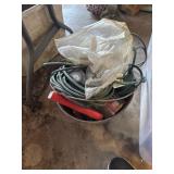 Bucket with extension cords and more