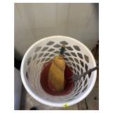 Laundry basket, broom head and 2 red baskets