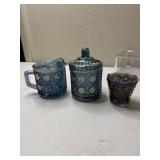 Carnival glass creamer and sugar and even older