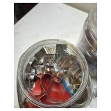 2 jars full of cookie cutter