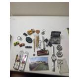 Lot cleanup, watch bands, toy cars. Pocket