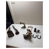 2 vintage cow bells. Eagle, swinging horse. Cast