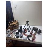 Canon 35mm film camera with lenses, tripod, color