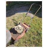 Whites push type mower has compression and weed