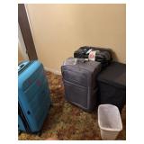 Suit cases, laundry basket and trash can