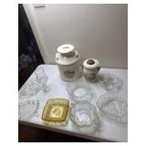 Vintage and newer glass serving pieces. Milk can