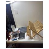 Scale works, flashlight, batteries dish dry rack