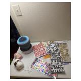 Craft stickers, rolls of yarn and lots of