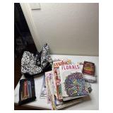 Bag of quilting books, coloring books, magazines,