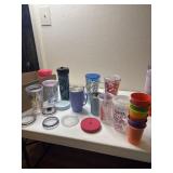 Travel cups and kid Tupperware cups, no lids
