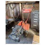 MTD 5 Hp rear tine tiller has compression has sat