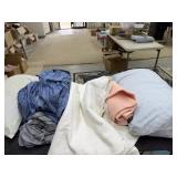 Pillows, sheets and blankets