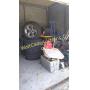 Unit has Truck Tires and rims, bicycles, tools.