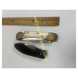 Folding knives. (2) The first is a lockback