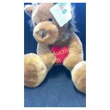 Soft lion teddy bear - lion holding a soft heart