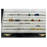17 Assorted Rings in Display Case Various Sizes