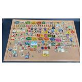 Novelty Pin Collection on Framed Cork Display