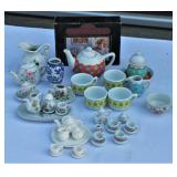 Several Miniature Ceramic Tea Sets