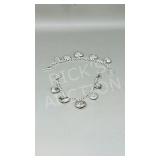 pair of silver color heart theme charm bracelets