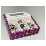 pink jewelry box w/ assorted fashion rings