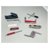various folding pocket knives - some advertising